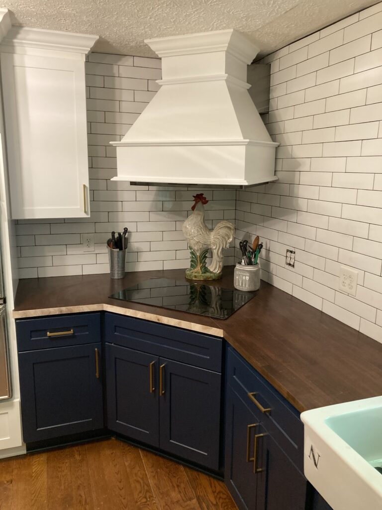 Creative ways to update kitchen cabinets without replacement, featuring painted cabinets, new hardware, glass inserts, under-cabinet lighting, decorative molding, and open shelving